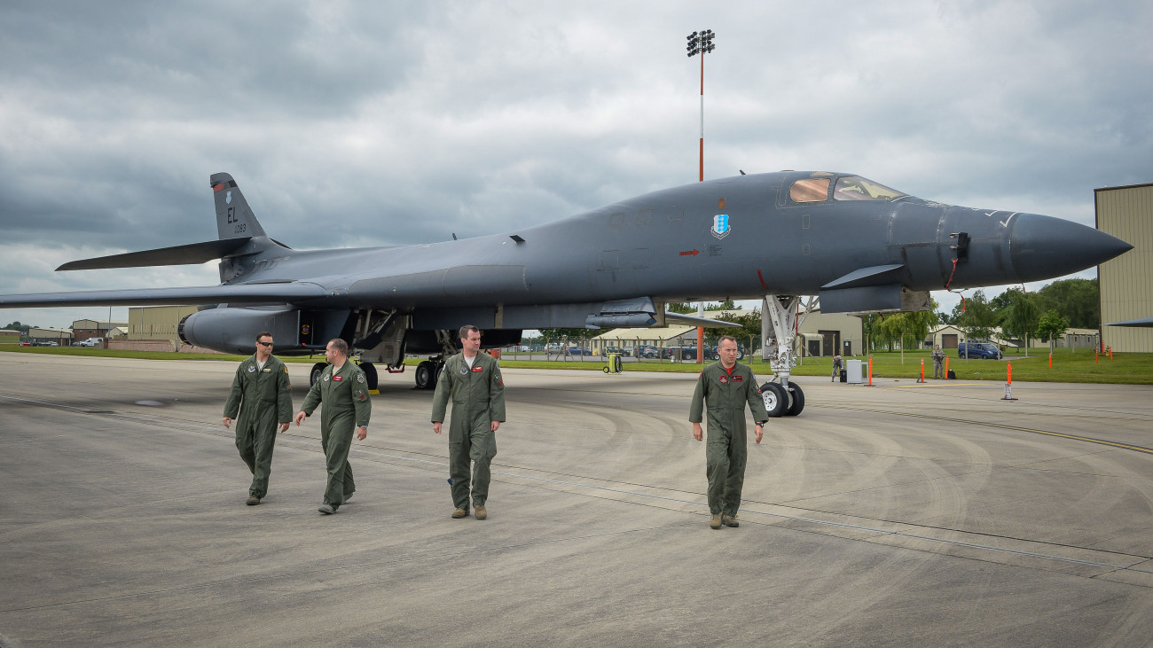 The flight crew of a B-1B Lancer walk away from the bomber as it sits on the pan at RAF Fairford. (Photo by Ben Birchall/PA Images via Getty Images)