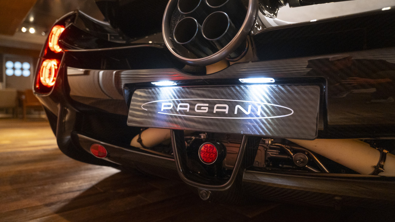 Signage on a PaganiÂ Automobili SpA Utopia supercar at the companys showroom in Hong Kong, China, on Thursday, Nov. 23, 2023. Italian hypercar makerÂ PaganiÂ is exploring new technologies including electric vehicles, an area where Chinas expertise would be of help for European brands, according to Pagani. Photographer: Chan Long Hei/Bloomberg via Getty Images
