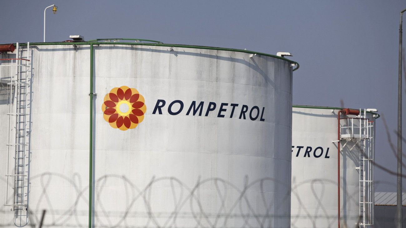 Oil storage tanks, operated by Rompetrol, stand near a gas station in Bucharest, Romania, on Thursday, March 24, 2011. Romania is unlikely to accept an offer by Rompetrol Group NV, the countrys second-largest oil refiner, to pay back only part of its debt, the head of the tax agency said. Photographer: Aga Luczakowska/Bloomberg via Getty Images