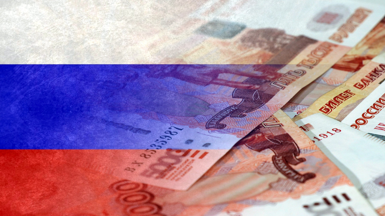 Flag of Russia and Russian rubles in cash (money, inflation, success, markets, finance, business)