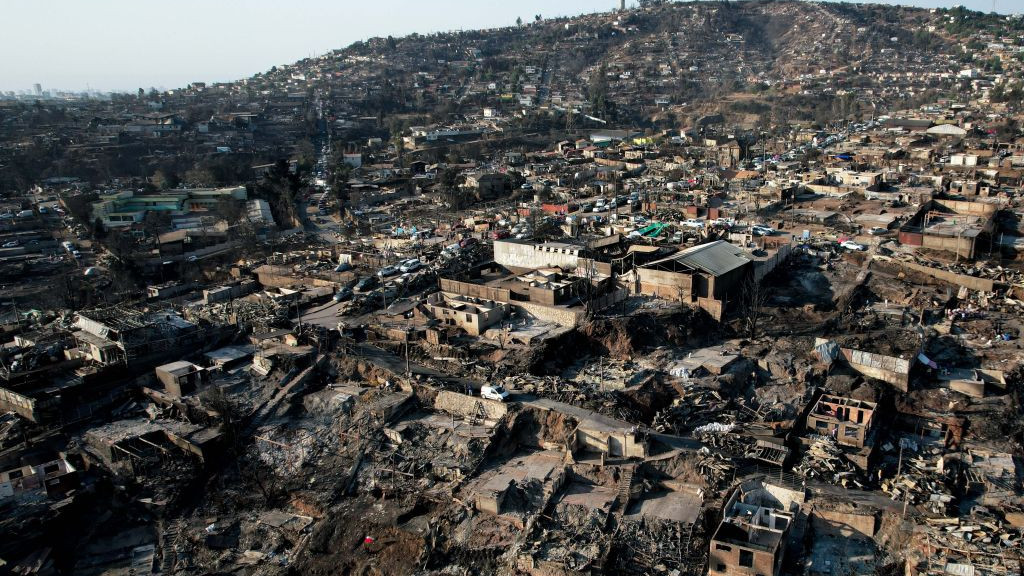 VINA DEL MAR, CHILE - FEBRUARY 5: An aerial view of houses destroyed by forest fires in Vina del Mar, Chile on February 5, 2024. According to authorities, more than 15,000 homes were destroyed and 123 people died in the fire. (Photo by Lucas Aguayo Araos/Anadolu via Getty Images)