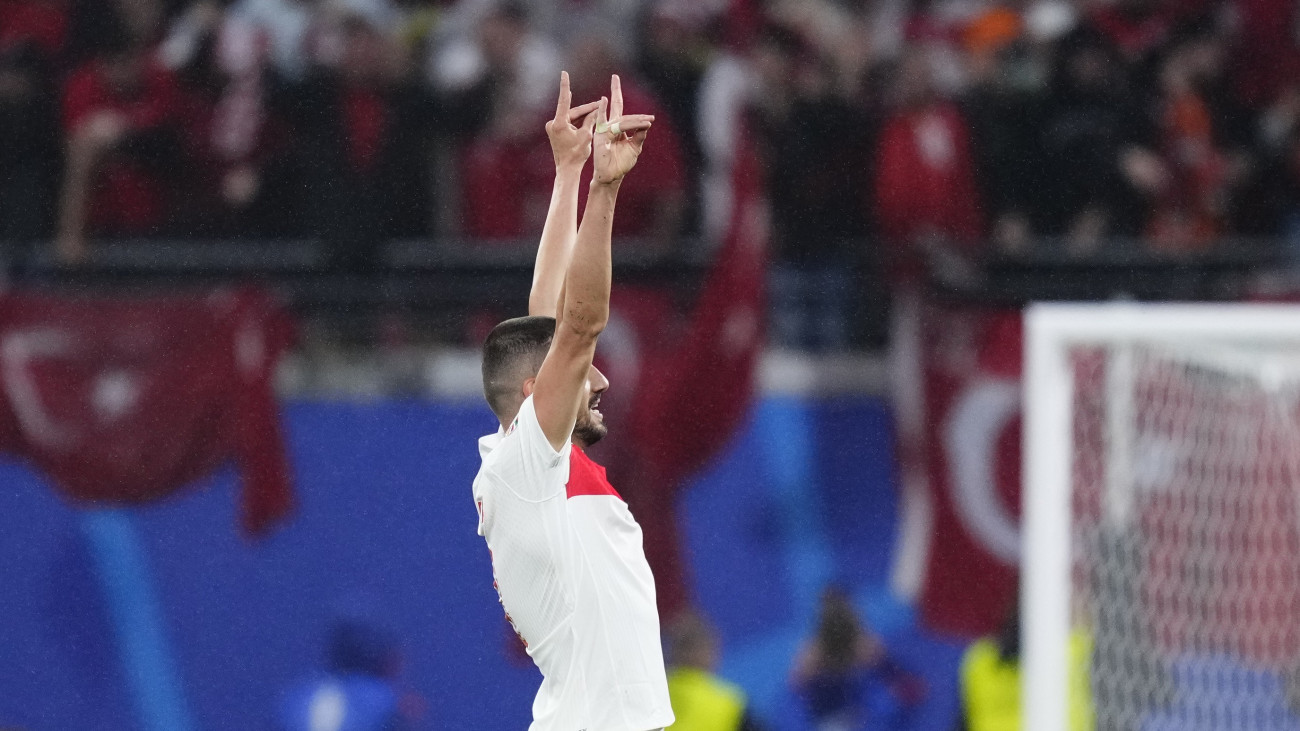 Merih Demiral centre-back of Turkey and Al-Ahli SFC celebrates his second goal by making a hand gesture similar to the Ulkucu salute for which UEFA is investigating him during the UEFA EURO 2024 round of 16 match between Austria and Turkiye at Football Stadium Leipzig on July 2, 2024 in Leipzig, Germany.  (Photo by Jose Breton/Pics Action/NurPhoto via Getty Images)
