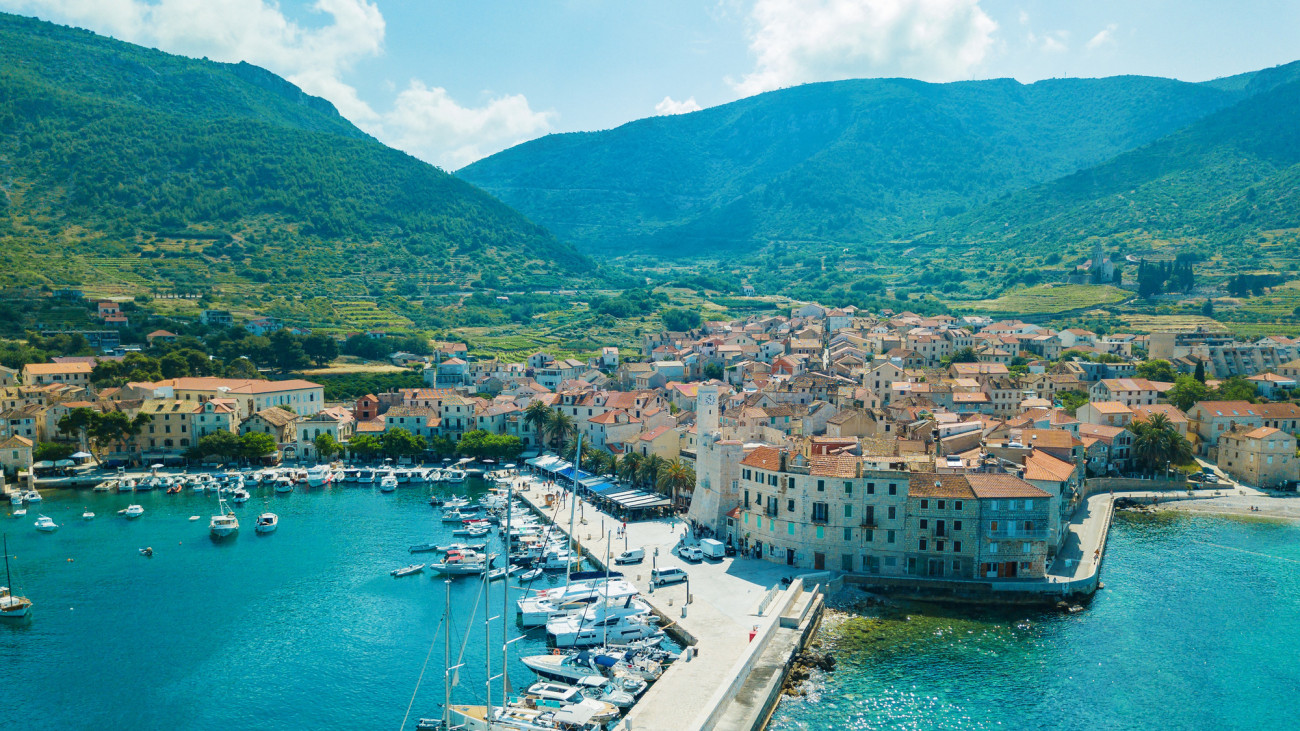 KomiĹža town on island Vis, Dalmatia, Croatia, where parts of Mamma Mia 2 movie were filmed. Photo made with drone DJI Mavic Pro from above.