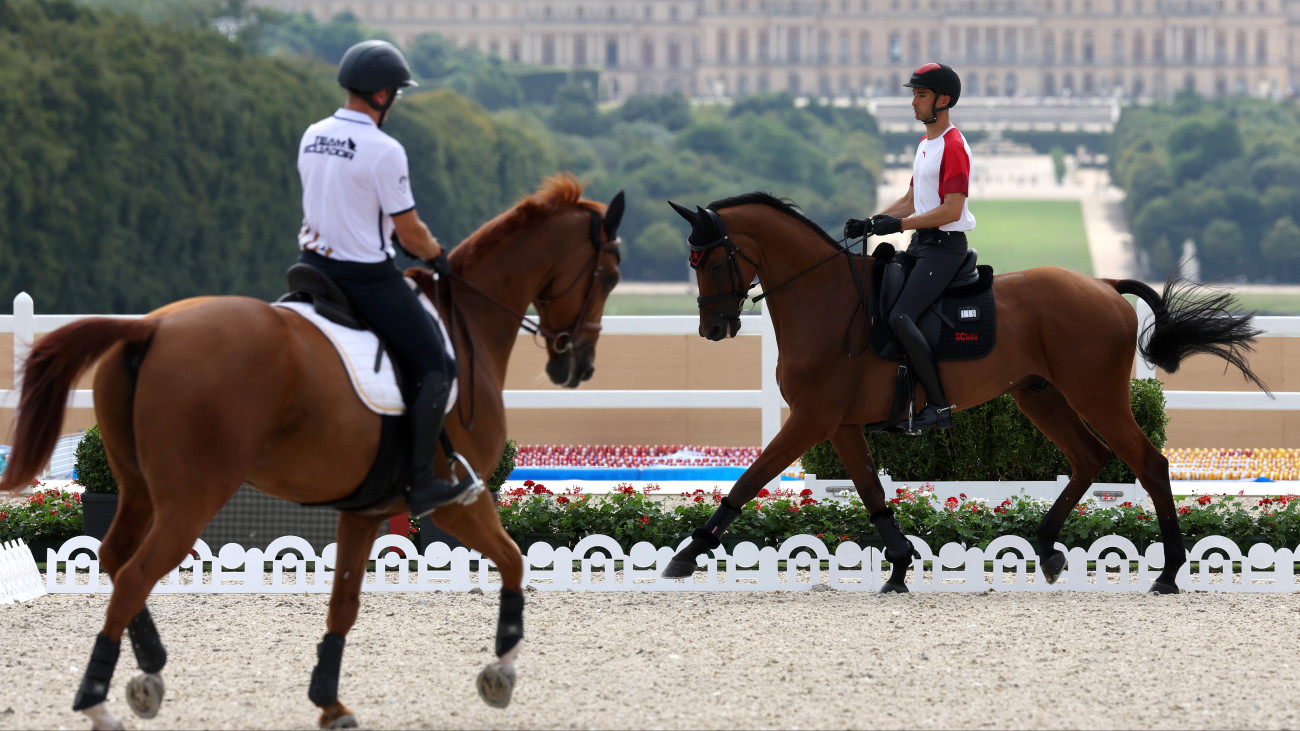 PARIS, FRANCE - JULY 25: Alex Hua Tian and horse Jilsonne Van Bareelhof of Team Peoples Republic of China practice dressage during an Equestrian Eventing training session ahead of the Paris 2024 Olympics Games at Chateau de Versailles on July 25, 2024 in Versailles, France. (Photo by Mike Hewitt/Getty Images)