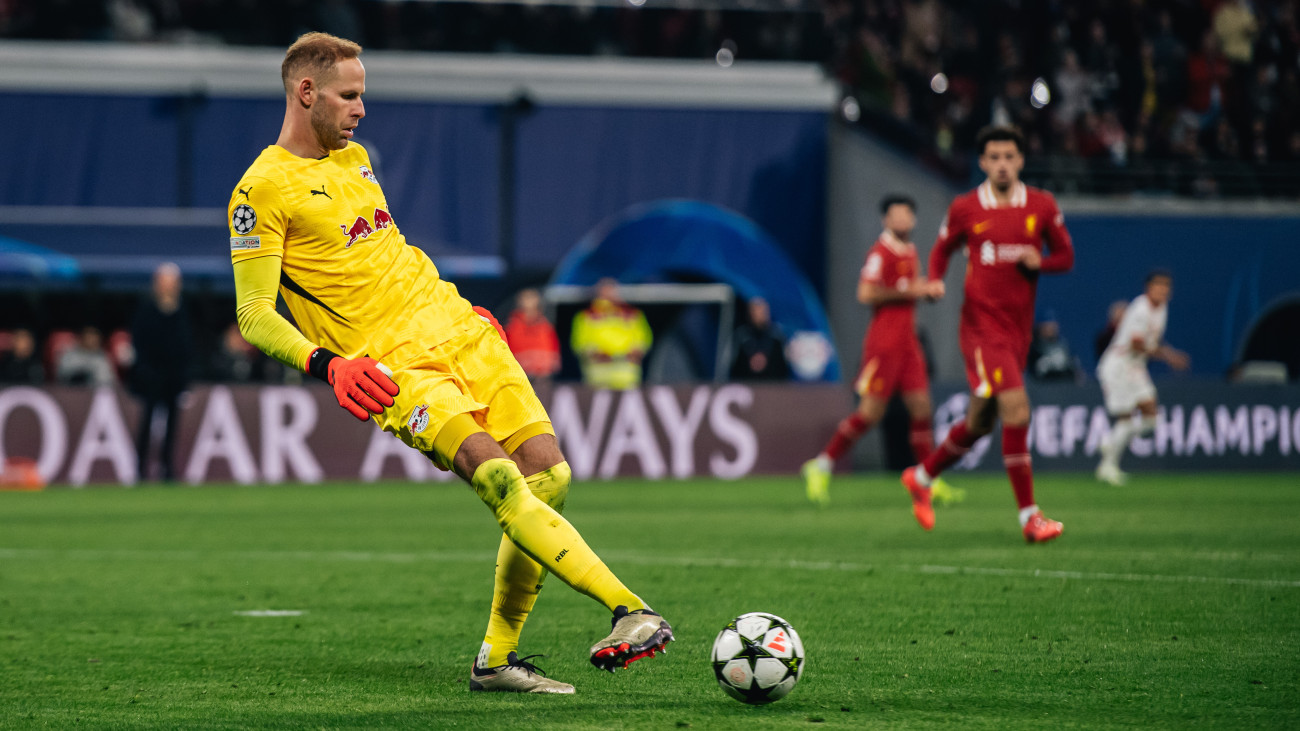 LEIPZIG, GERMANY - OCTOBER 23: Peter Gulacsi of RB Leipzig in action during the UEFA Champions League match between RB Leipzig and Liverpool at Red Bull Arena on October 23, 2024 in Leipzig, Germany. (Photo by Hesham Elsherif/Anadolu via Getty Images)