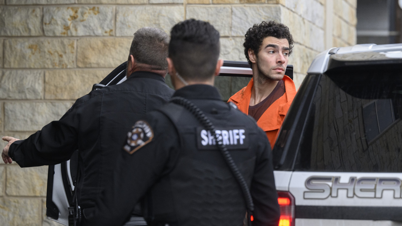 HOLLIDAYSBURG, PENNSYLVANIA - DECEMBER 10: Suspected shooter Luigi Mangione is led into the Blair County Courthouse for an extradition hearing December 10, 2024 in Hollidaysburg, Pennsylvania. Mangione has been arraigned on weapons and false identification charges related to the fatal shooting of United Healthcare CEO Brian Thompson in New York City. Mangione is incarcerated in the State Correctional Institution in Huntingdon, Pennsylvania awaiting extradition to New York.